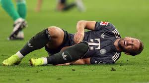 KANE INJURED AS BAYERN HOLD LEVERKUSEN TO BUNDESLIGA DRAW.